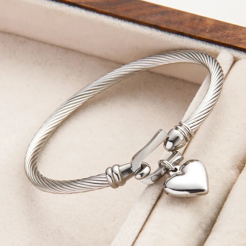 Pulsera abierta de moda en acero inoxidable de alta calidad. Para Hombre y Mujer.